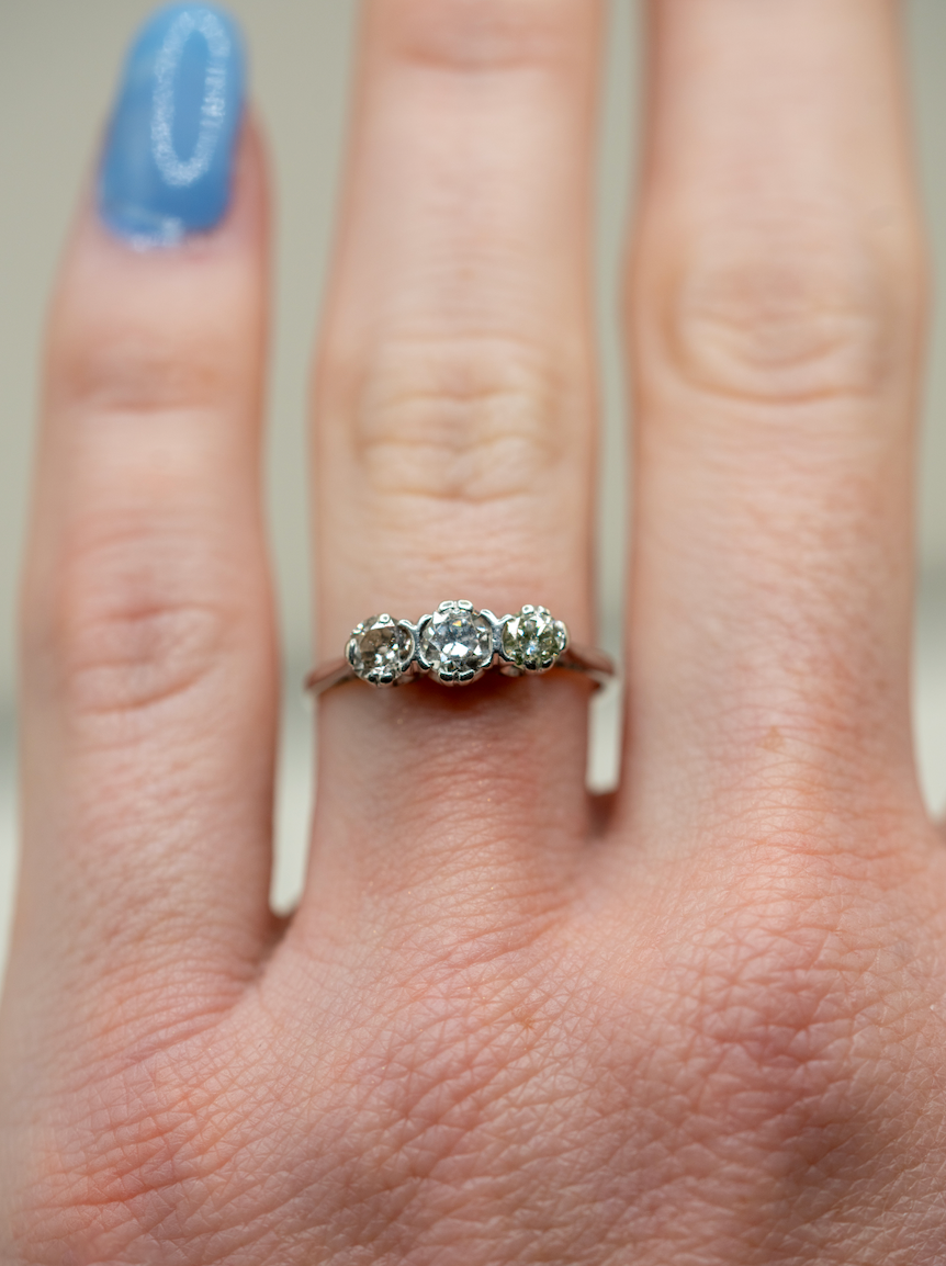 18k wg old cut diamond three stone band